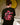 Camiseta Flower — camiseta dobrada mostrando estampa completa