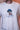 Camiseta Mascote — close na estampa exclusiva e detalhe da arte