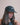 MODELO USANDO FIVE PANEL OLHANDO P BAIXO

