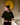 Camiseta Flower — modelo vestindo a camiseta, pose lateral